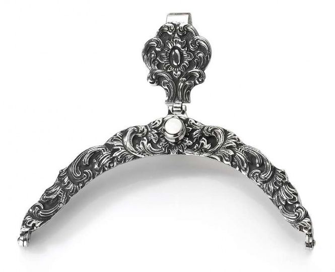 Hovedbilde Veskelås plett