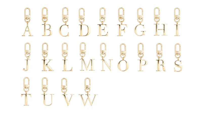 Dark nøkkelring, veskepynt Bokstav Gullforgylt