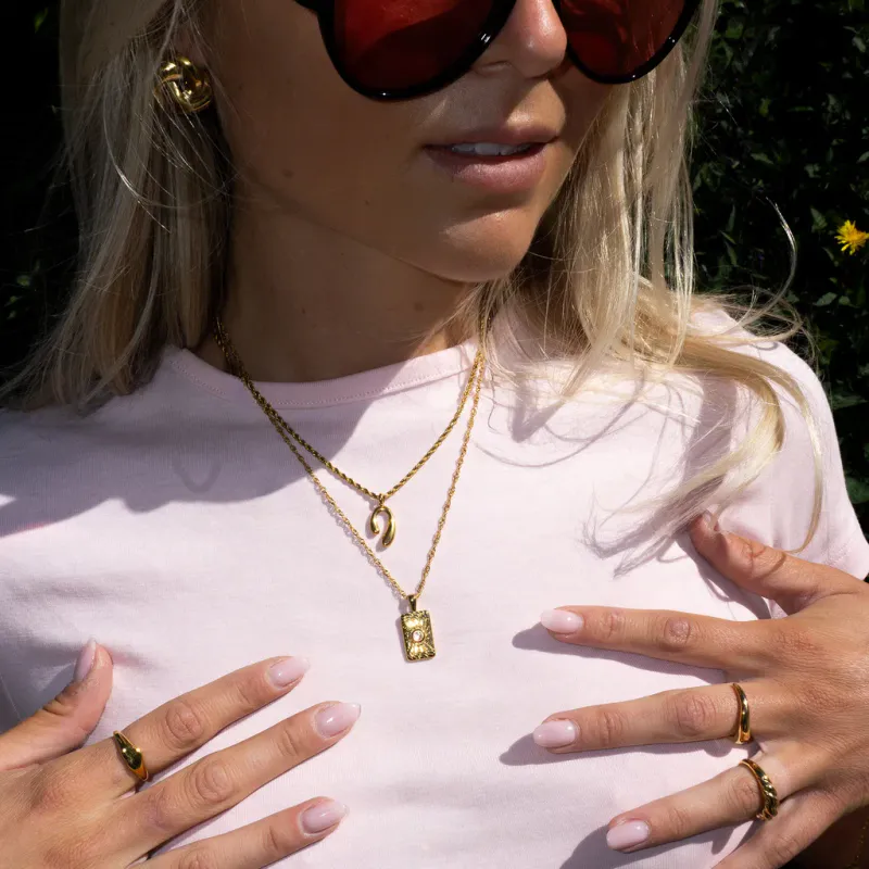 Frida Leonore Current necklace i forgylt stål